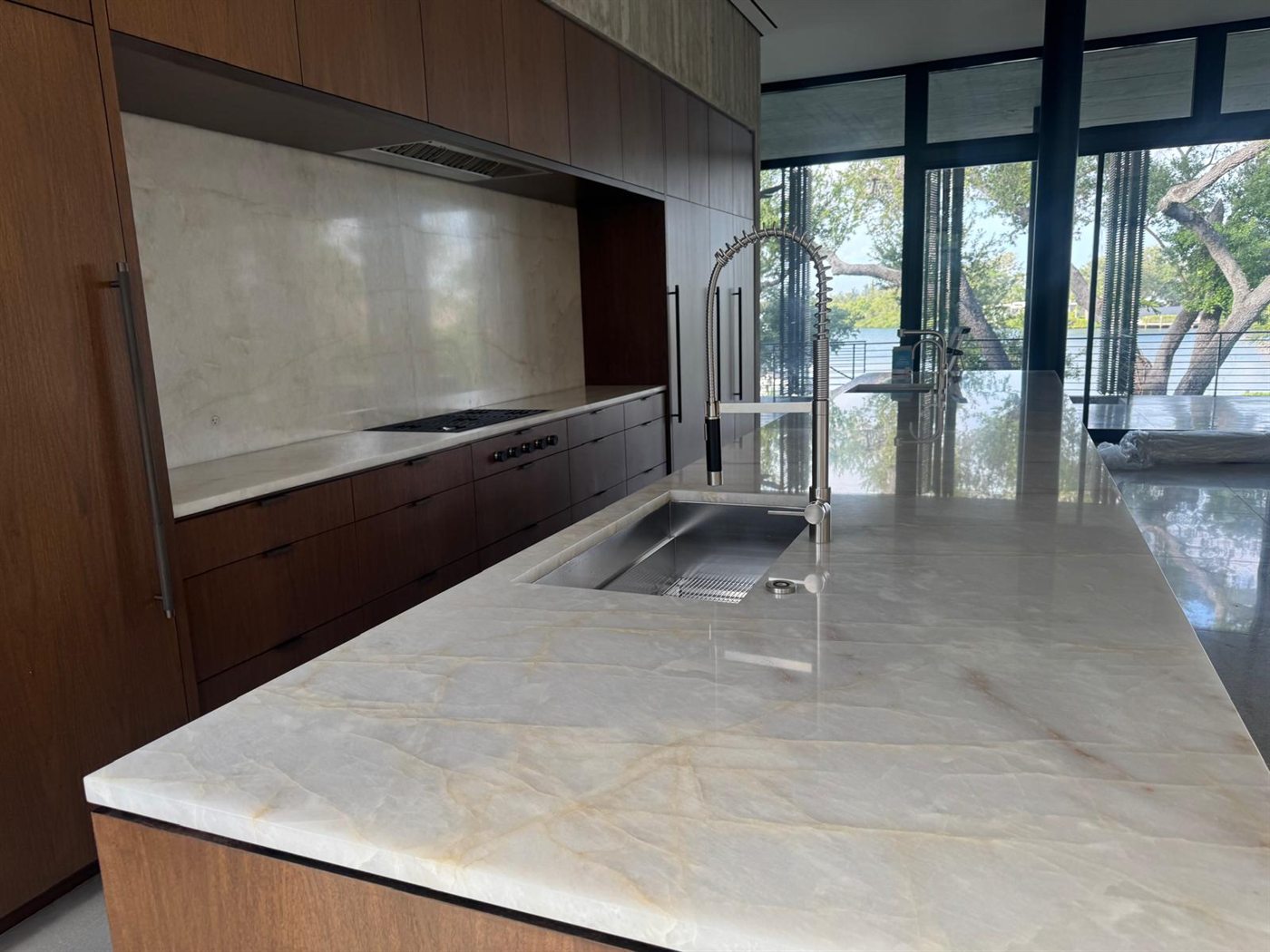 Gleaming kitchen countertops and polished surfaces after a detailed deep clean