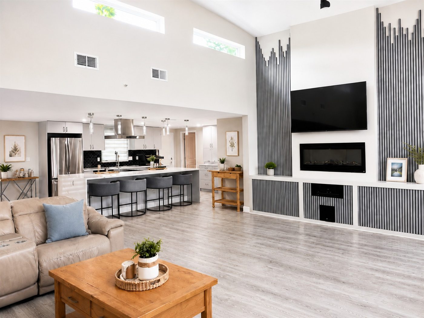 Bright open living room and kitchen kept fresh with regular maintenance cleaning